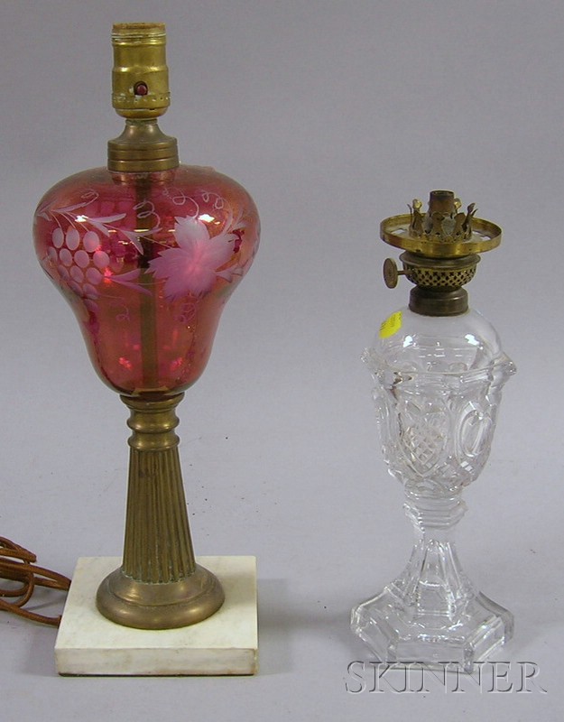 Appraisal: Sandwich Colorless Pressed Glass Fluid Lamp and an Etched Ruby