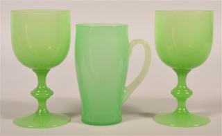 Appraisal: Three Pieces of Signed Stueben Green Glass Two goblets and