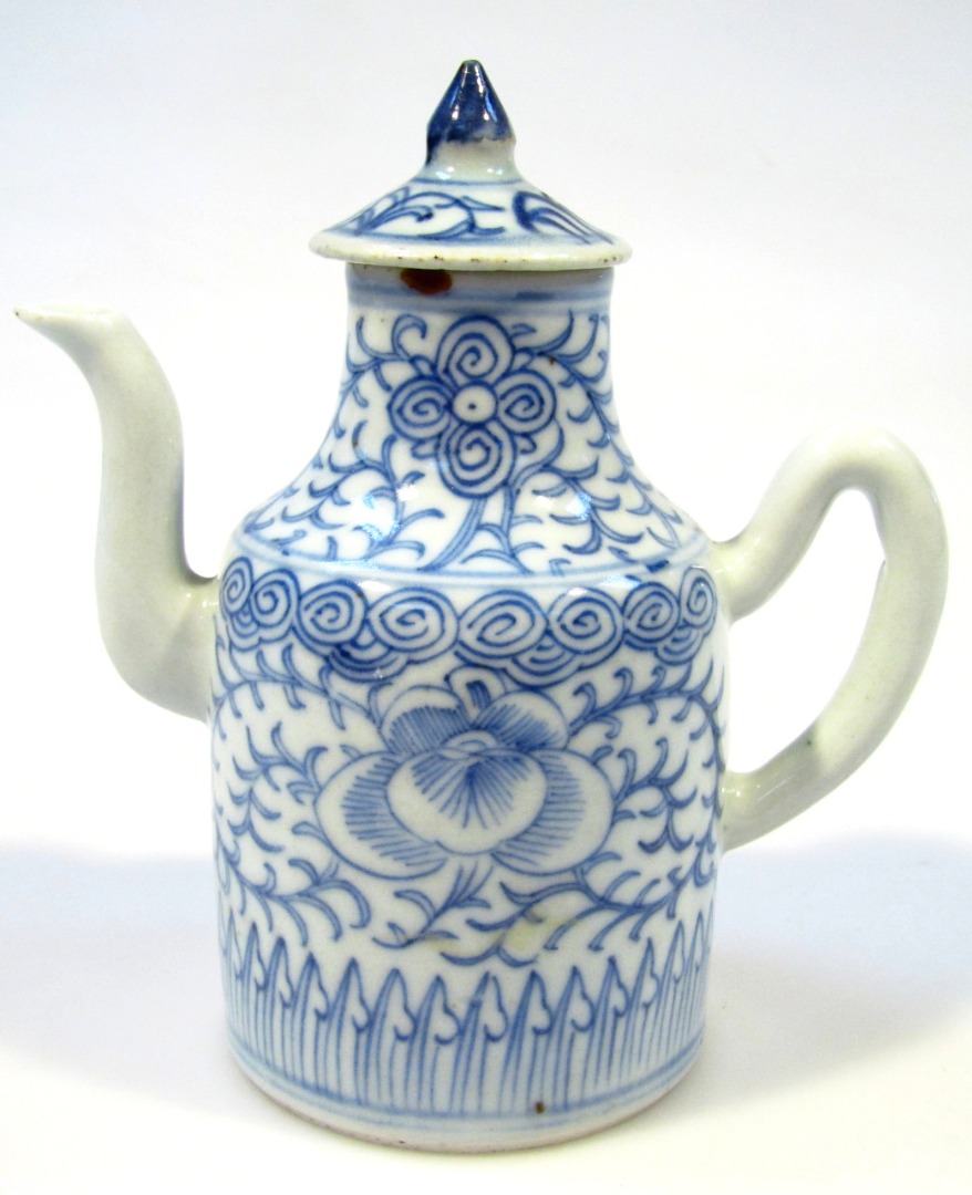 Appraisal: A Chinese Qing period porcelain coffee pot of miniature outline