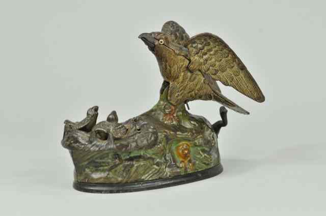 Appraisal: EAGLE AND EAGLETTS MECHANICAL BANK Green Base J E Stevens