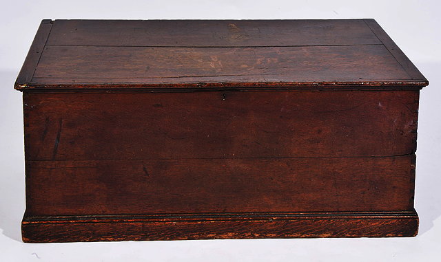 Appraisal: AN ANTIQUE OAK BLANKET BOX the plank top with cleated