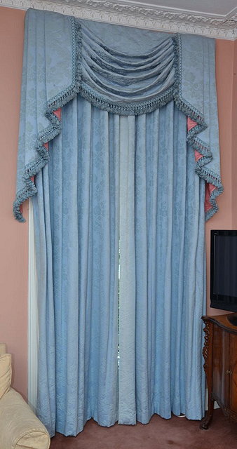 Appraisal: THREE PAIRS OF FULL LENGTH BLUE CURTAINS each with swag