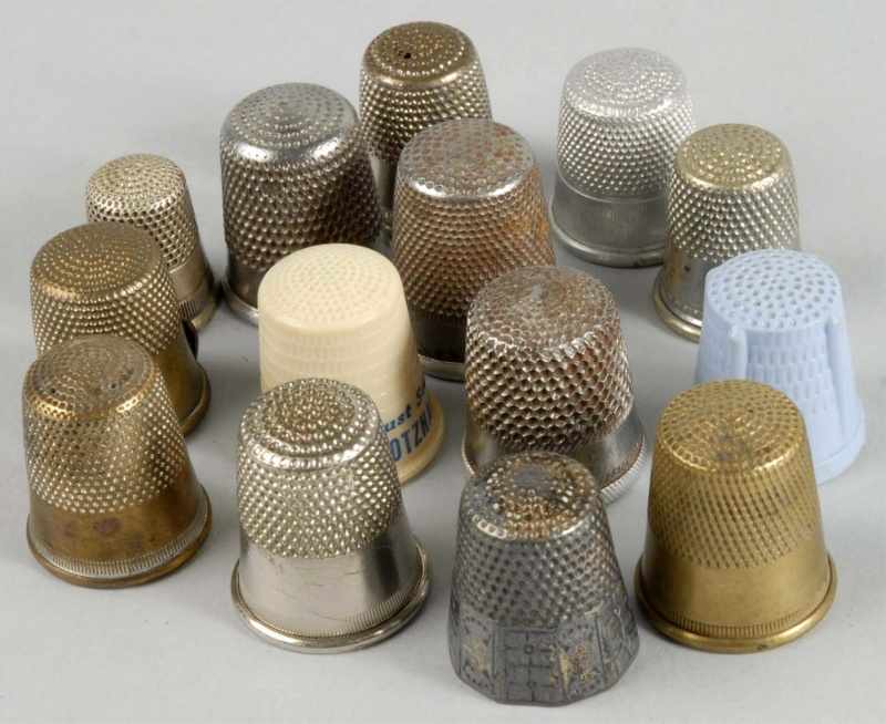 Appraisal: Lot of Metal Plastic Thimbles Description Several have advertising some