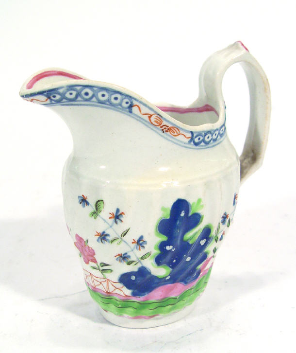 Appraisal: English early th Century fluted pottery jug with hand painted