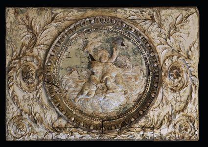 Appraisal: FRENCH LIMEWOOD OAK AND MAHOGANY RELIEF-CARVED PANEL The central rondel