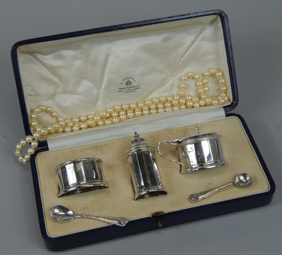 Appraisal: An Art Deco period George V silver three piece cruet