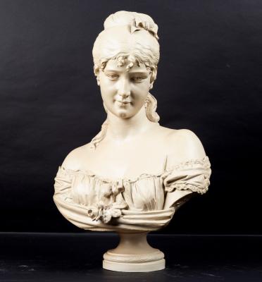 Appraisal: A resin bust of a young woman signed C Lapini