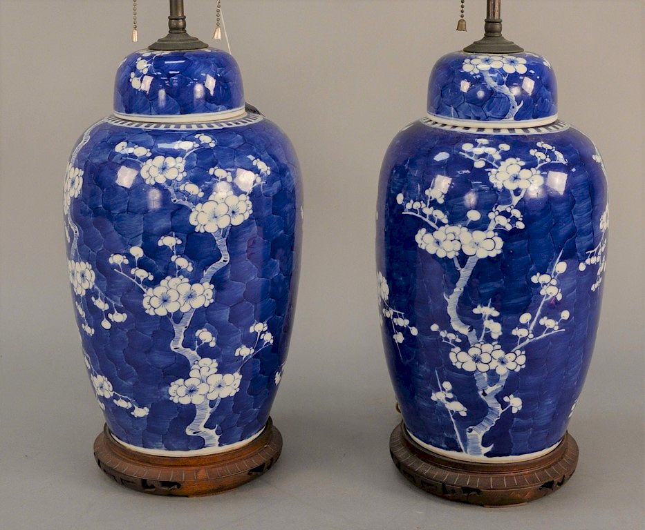 Appraisal: Pair of Chinese blue and white covered jars with apple