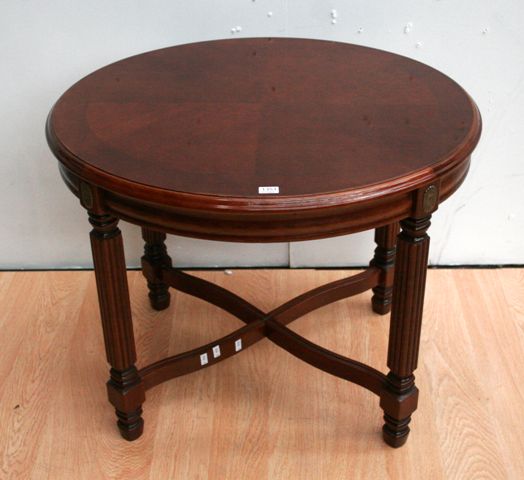 Appraisal: A Louis XVI style stained maple occasional table with brass