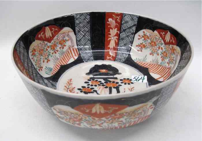 Appraisal: JAPANESE IMARI PORCELAIN BOWL Hand painted with cartouches of floral