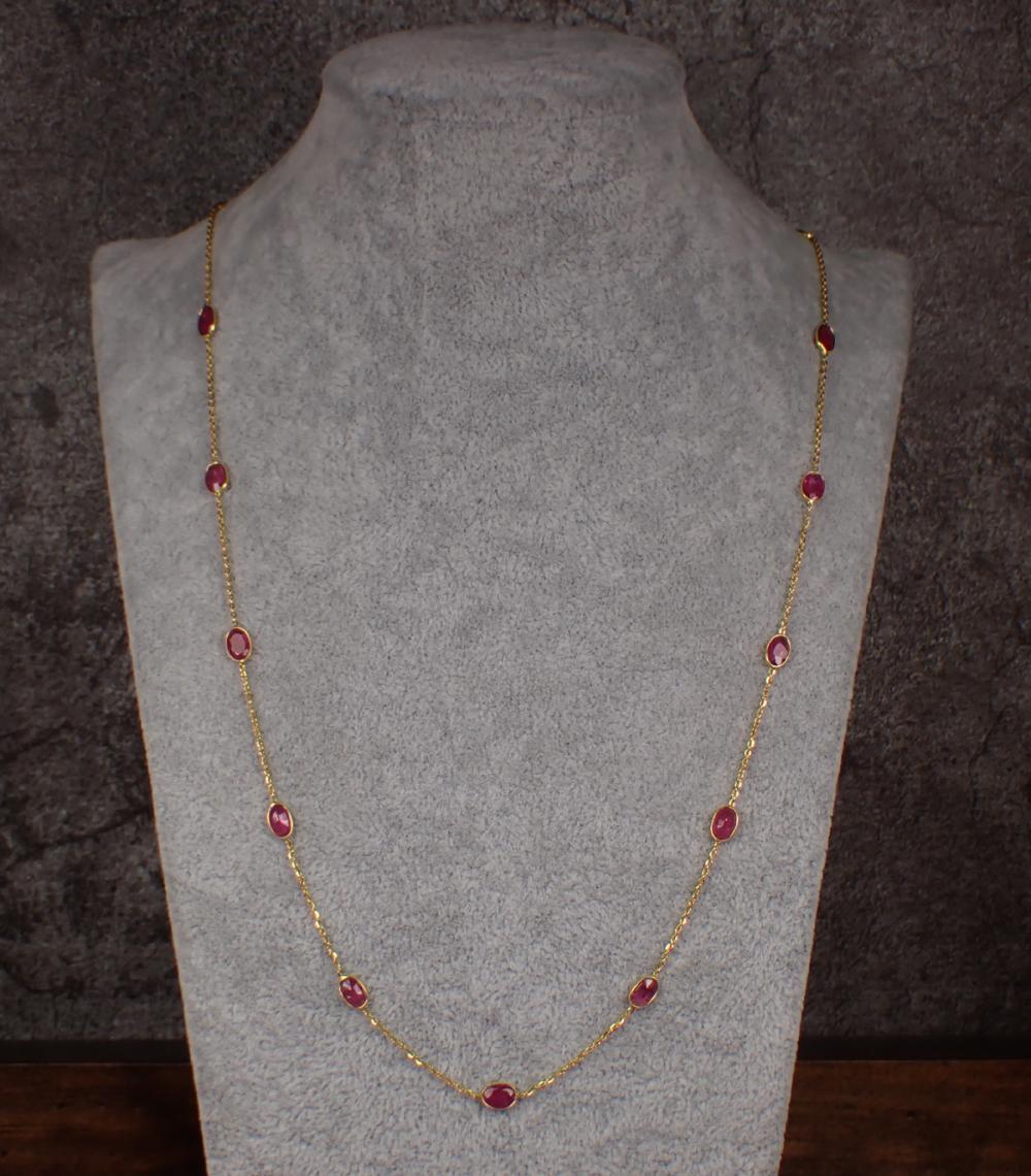 Appraisal: RUBY AND EIGHTEEN KARAT GOLD CHAIN NECKLACE The k yellow