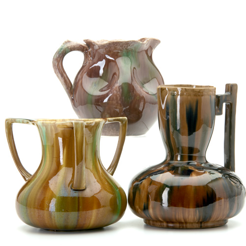 Appraisal: WANNOPEE Three vessels covered in glossy flambe glaze two pitchers