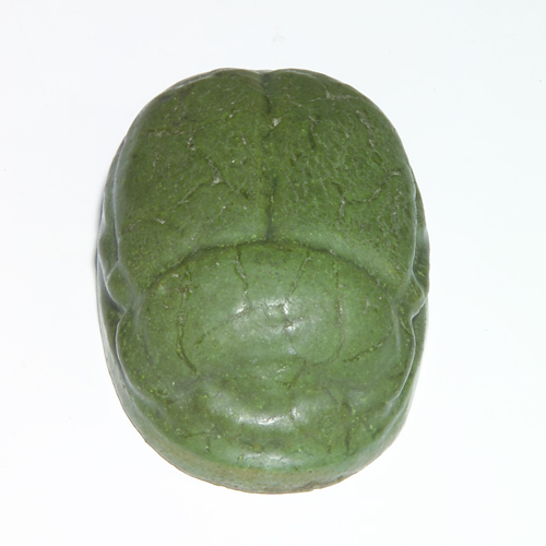 Appraisal: GRUEBY Scarab-shaped paperweight covered in matte green glaze chip to