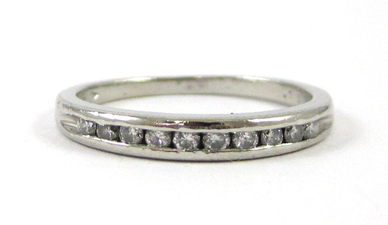 Appraisal: TWO DIAMOND RINGS including a platinum Love Story ring channel