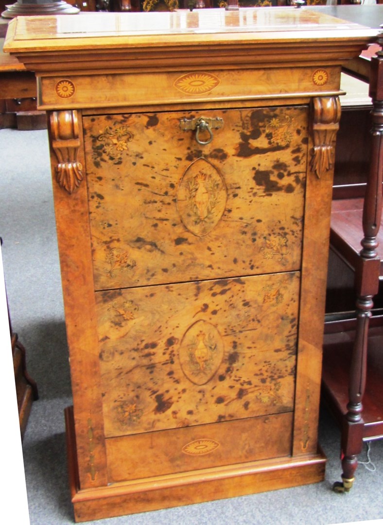 Appraisal: A th century marquetry inlaid walnut music stand the angle