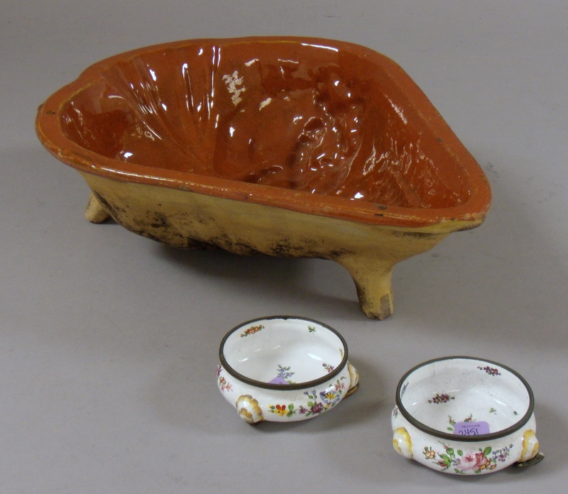 Appraisal: French Glazed Yellow Ware Mold and a Pair of Continental