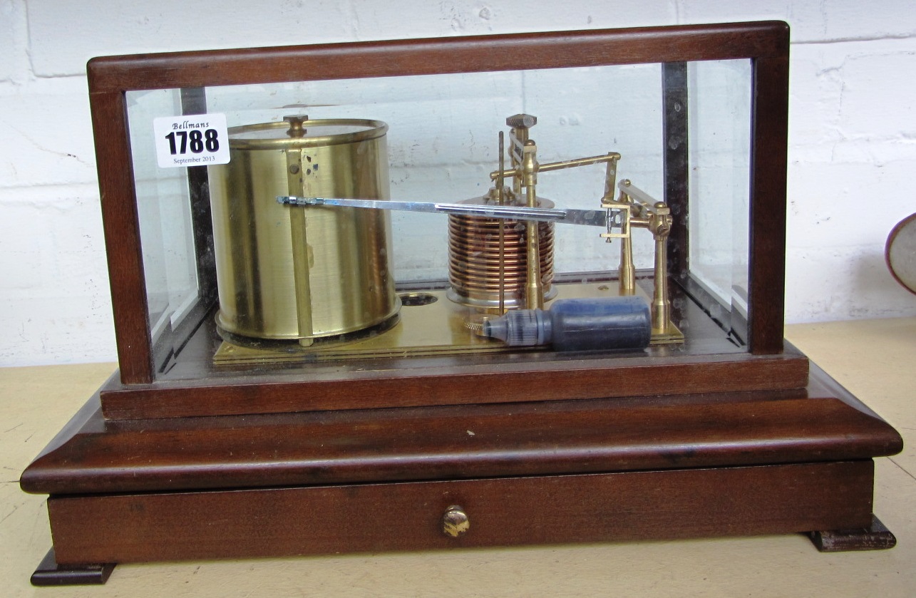 Appraisal: A mahogany cased barograph th century in a bevelled glass