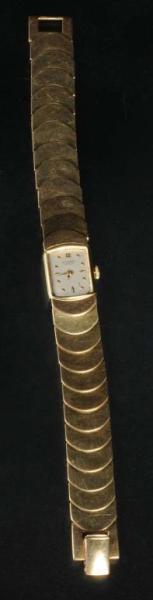 Appraisal: Antique Jewelry K Y Gold Universal Geneve Watch Description Weighs