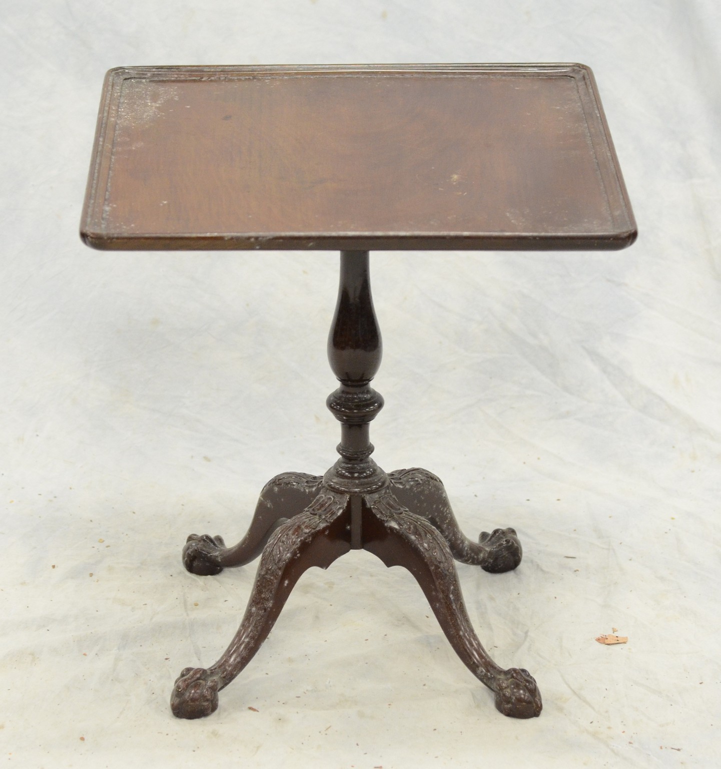 Appraisal: Carved mahogany Chippendale style lamp table with carved ball and