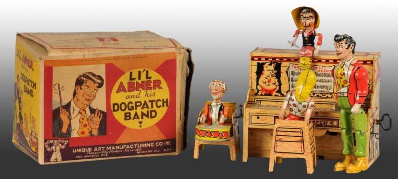 Appraisal: Tin Litho Unique Art Lil Abner Wind-Up Toy Description American