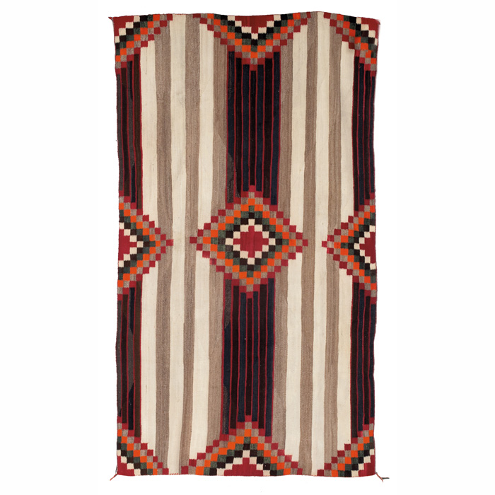 Appraisal: Navajo rug c diamond pattern in red orange blue and