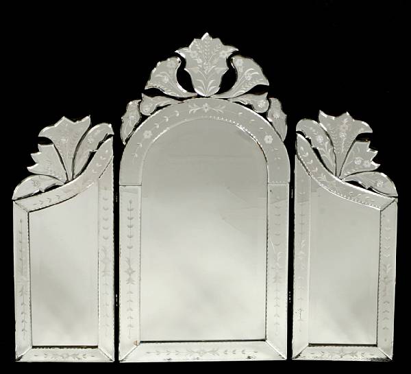 Appraisal: A Venetian acid etched dressing table mirror with three fold