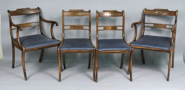 Appraisal: Four th Century Irish sabour leg chairs with brass inlay