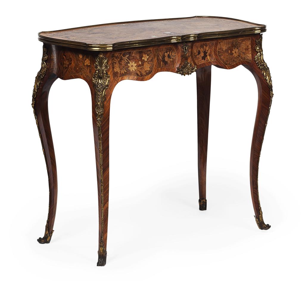 Appraisal: FINE FRENCH WALNUT TULIPWOOD INLAID AND GILT METAL MOUNTED OCCASIONAL