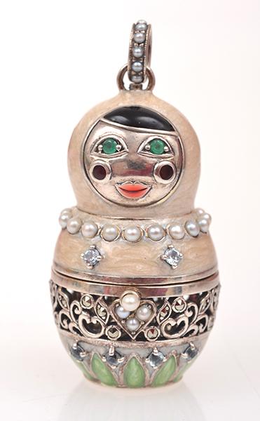 Appraisal: A BABUSHKA DOLL PENDANT IN ENAMEL EMERALD SEED PEARL AND