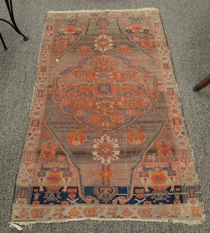 Appraisal: Oriental throw rug worn ' x ' Oriental throw rug