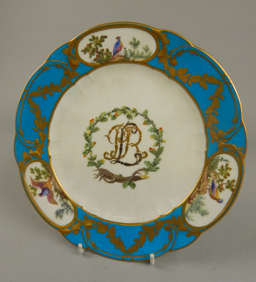 Appraisal: A thC Sevres style plate decorated to the border with