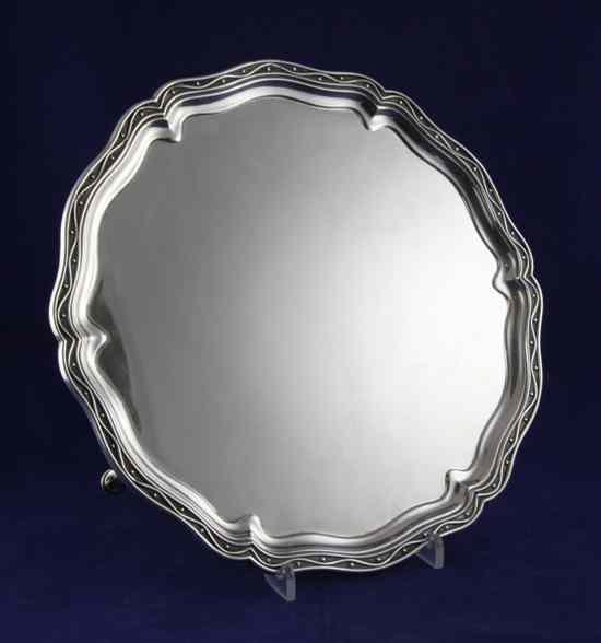 Appraisal: A George V silver salver of shaped circular form with