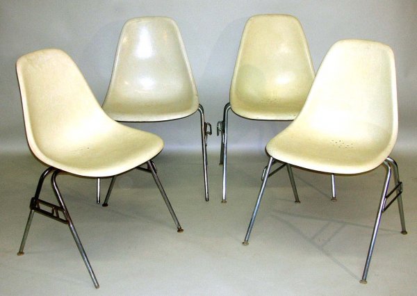 Appraisal: A set of four Eames Herman Miller stacking chairs Molded