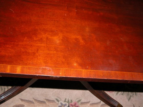 Appraisal: Artist Title Mahogany Georgian-style dining table rectangular mahogany cross banded