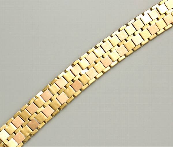 Appraisal: An eighteen karat bicolor gold flexible link bracelet Cartier France