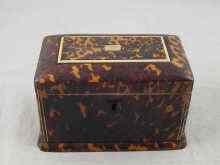 Appraisal: A Tortoiseshell tea caddy with domed top blond figuring and