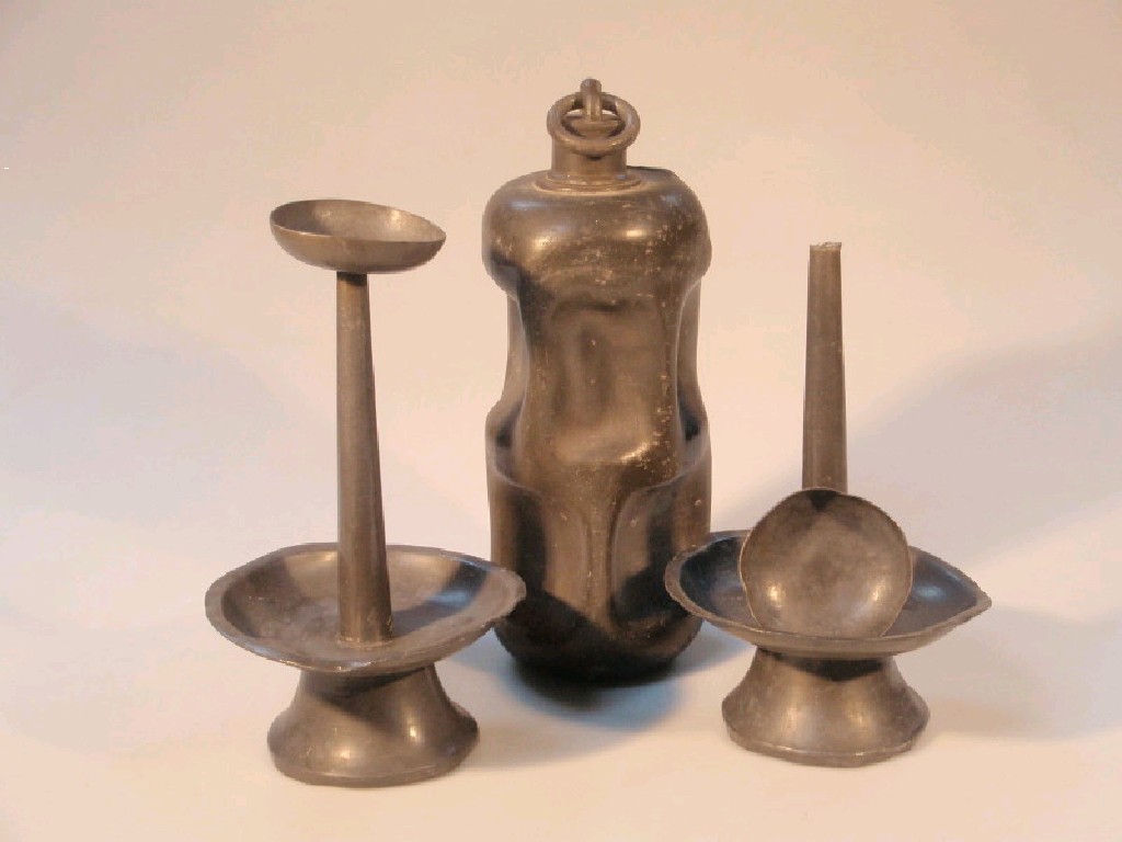 Appraisal: A pair of period pewter stands possibly Russian with trumpet