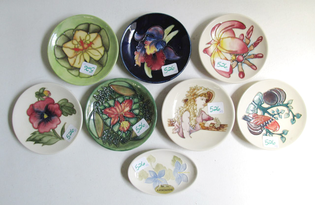 Appraisal: EIGHT MOORCROFT POTTERY DISHES hand painted under glaze in various