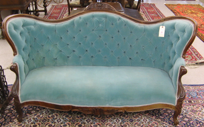 Appraisal: A VICTORIAN SERPENTINE-BACK SOFA American c having a molded walnut