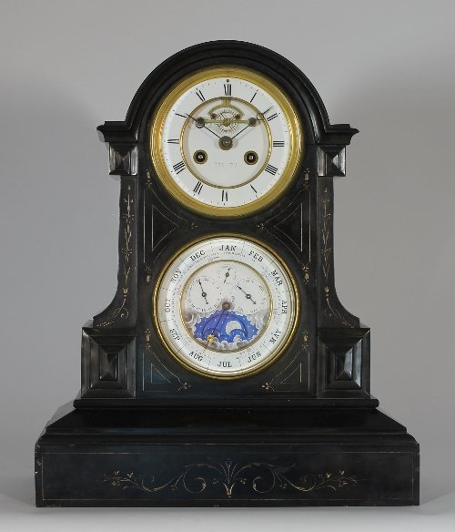 Appraisal: A black marble calendar clock the case with incised decoration