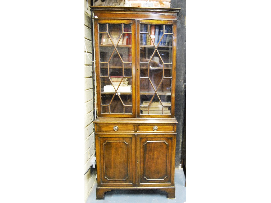 Appraisal: An early th century mahogany library bookcase of small size