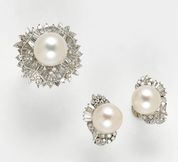 Appraisal: A cultured pearl diamond and fourteen karat white gold ring