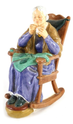 Appraisal: A Royal Doulton figure A Stitch in Time HN printed