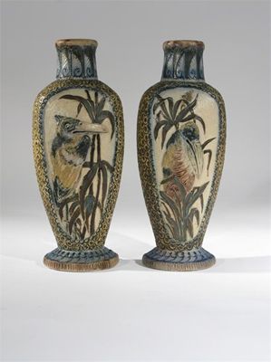 Appraisal: A pair of Martin Brothers tall stoneware bird vases by