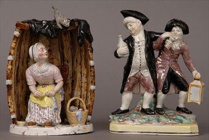 Appraisal: TWO STAFFORDSHIRE PEARLWARE GROUPS The one Parson Clark holding a