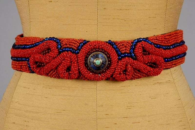 Appraisal: ETHNOGRAPHIC BEADED BELT with STONE ORNAMENT th C Wide black