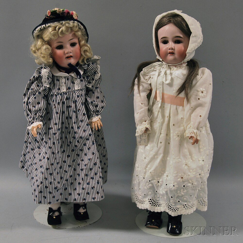 Appraisal: Two German Bisque Head Dolls both with open mouths brown