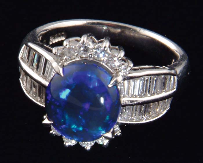 Appraisal: DIAMOND BLACK OPAL AND PLATINUM LADIES RING Thirty four diamonds