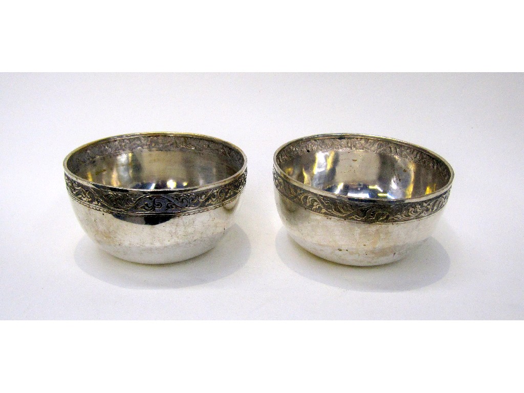 Appraisal: Pair of oriental white metal bowls