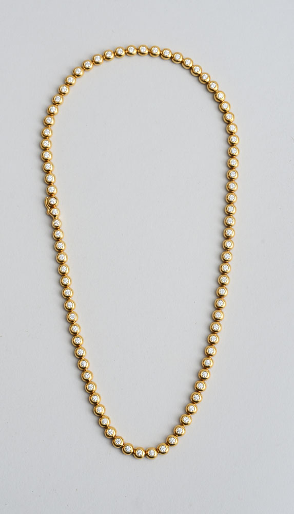 Appraisal: K GOLD AND DIAMOND NECKLACE TIFFANY CO Containing round brilliant-cut